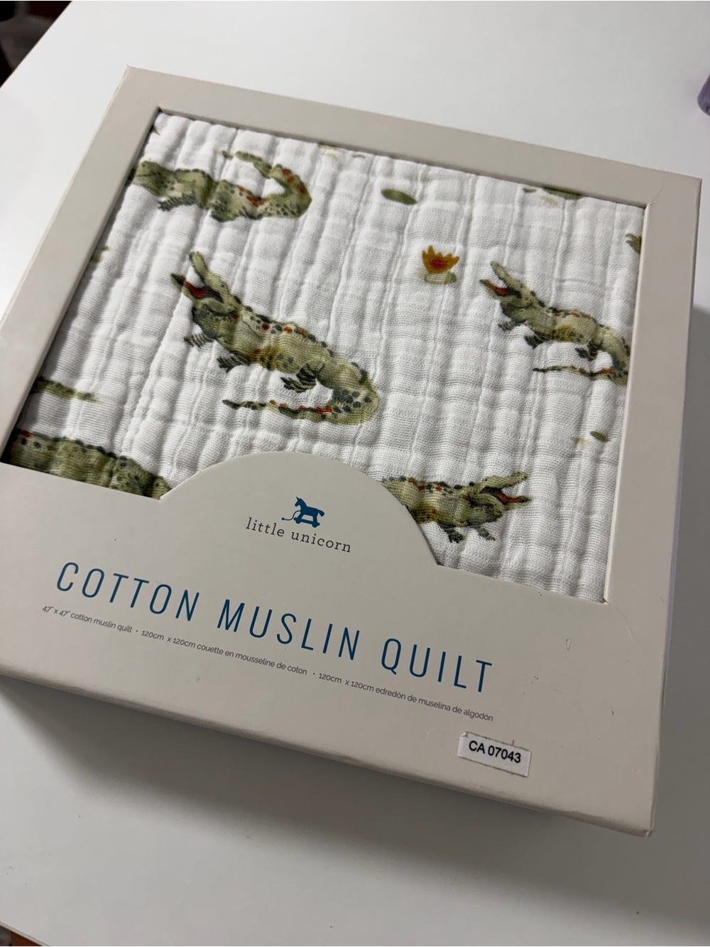 Little unicorn Cotton Muslin Quilt - White with Green Crocodile Print
